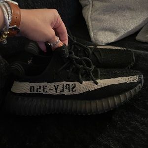 Yeezy women’s 7 7.5 black and cream Yeezys